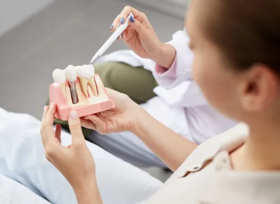 A patient consulting with a dentist about orthodontic options